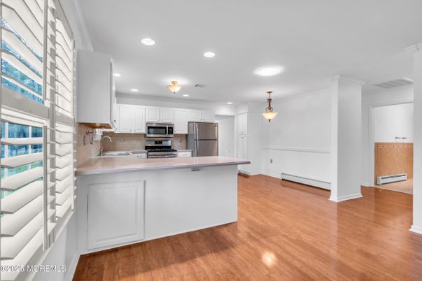 Interior, Kitchen, Pendant Lights, Recessed Lighting, Stainless Steel Appliances, Wood Texture Flooring