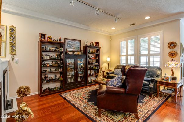 Fireplace, Interior, Living room, Recessed Lighting, Wood Texture Flooring