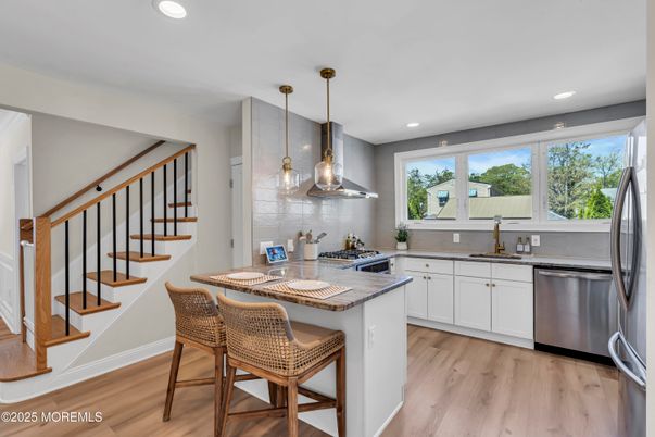 Interior, Kitchen, Pendant Lights, Recessed Lighting, Stainless Steel Appliances, Wood Texture Flooring