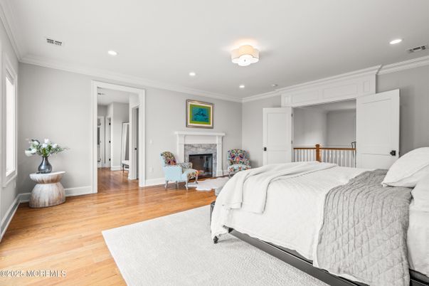 Bedroom, Fireplace, Interior, Recessed Lighting, Wood Texture Flooring