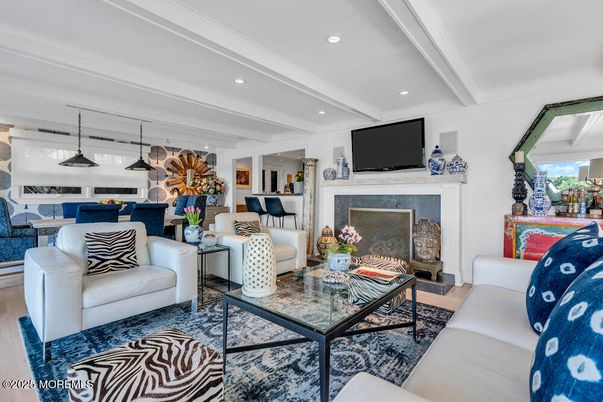 Dining room, Fireplace, Interior, Living room, Pendant Lights, Recessed Lighting, Wood Texture Flooring