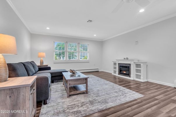 Fireplace, Interior, Living room, Recessed Lighting, Wood Texture Flooring