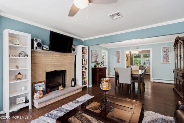 Chandelier, Dining room, Fireplace, Interior, Stone Walls, Wood Texture Flooring