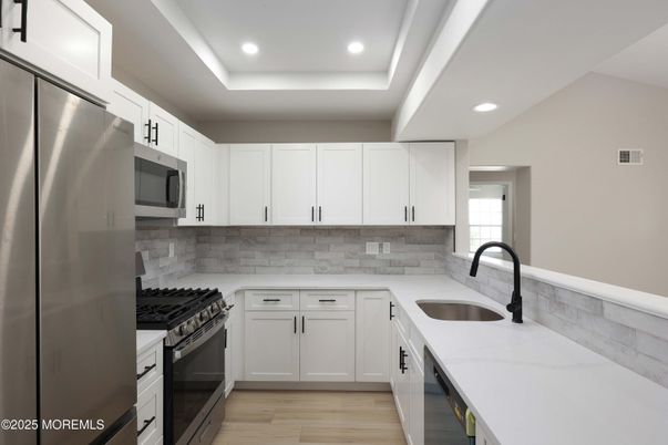 Interior, Kitchen, Recessed Lighting, Stainless Steel Appliances, Wood Texture Flooring