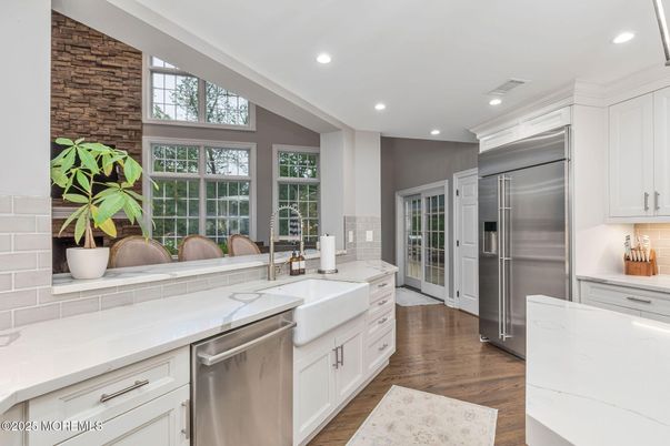 Interior, Kitchen, Recessed Lighting, Stainless Steel Appliances, Stone Walls, Wood Texture Flooring