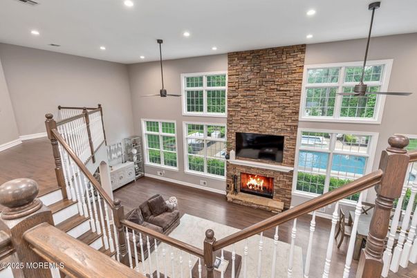 Dining room, Fireplace, Interior, Pendant Lights, Recessed Lighting, Stone Walls, Wood Texture Flooring
