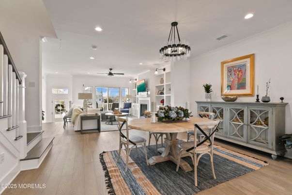 Dining room, Fireplace, Interior, Living room, Pendant Lights, Recessed Lighting, Wood Texture Flooring