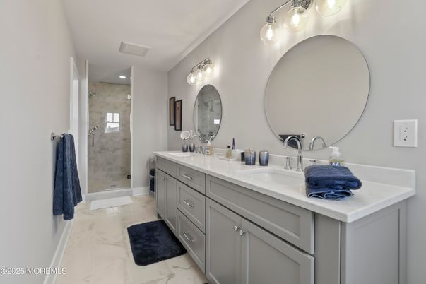 Bathroom, Dual Sink Vanities, Glass Shower, Interior, Marble, Recessed Lighting