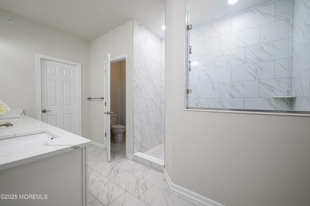 Bathroom, Dual Sink Vanities, Interior, Marble, Marble Walls, Recessed Lighting