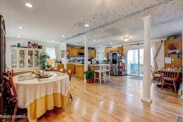Dining room, Interior, Kitchen, Recessed Lighting, Stainless Steel Appliances, Wood Texture Flooring