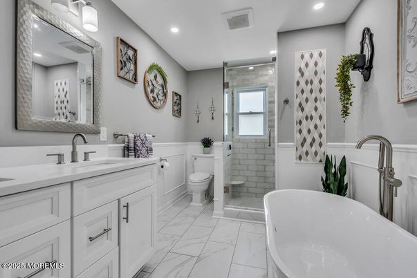 Bathroom, Dual Sink Vanities, Free Standing Baths, Glass Shower, Interior, Marble, Recessed Lighting