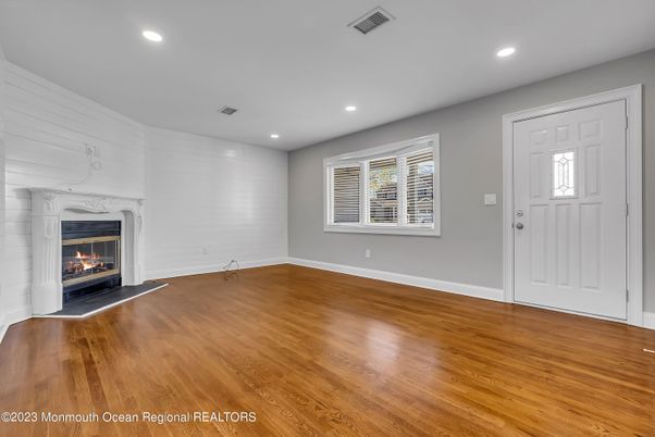 Empty room, Fireplace, Interior, Recessed Lighting, Wood Texture Flooring