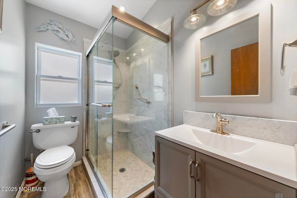 Bathroom, Glass Shower, Interior, Marble Walls, Wood Texture Flooring