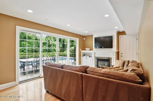 Fireplace, Interior, Living room, Recessed Lighting, Wood Texture Flooring