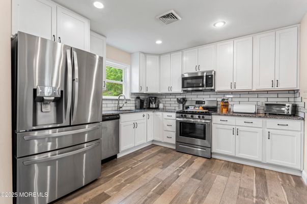 Interior, Kitchen, Recessed Lighting, Stainless Steel Appliances, Wood Texture Flooring