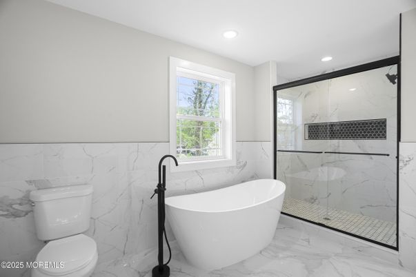Bathroom, Free Standing Baths, Glass Shower, Interior, Marble, Marble Walls, Recessed Lighting