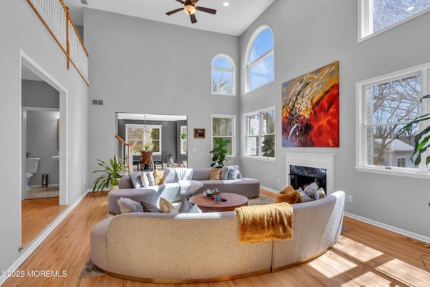 Dining room, Fireplace, Interior, Living room, Recessed Lighting, Wood Texture Flooring