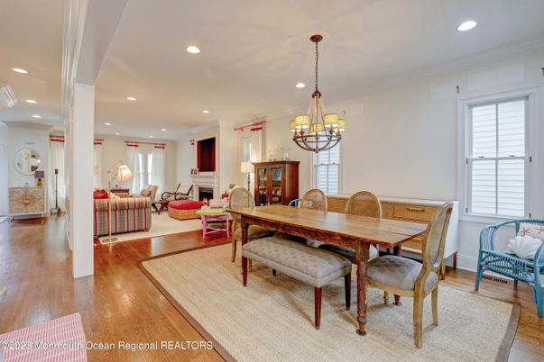 Chandelier, Dining room, Fireplace, Interior, Living room, Recessed Lighting, Wood Texture Flooring