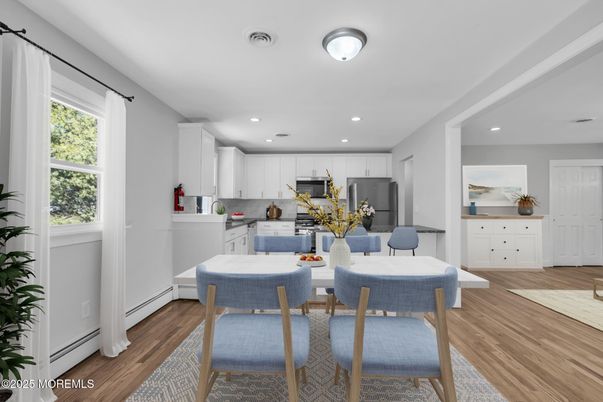 Dining room, Interior, Kitchen, Recessed Lighting, Stainless Steel Appliances, Wood Texture Flooring