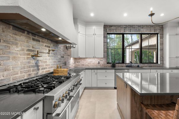 Interior, Kitchen, Recessed Lighting, Stainless Steel Appliances, Stone Walls