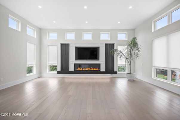 Empty room, Fireplace, Interior, Recessed Lighting, Wood Texture Flooring