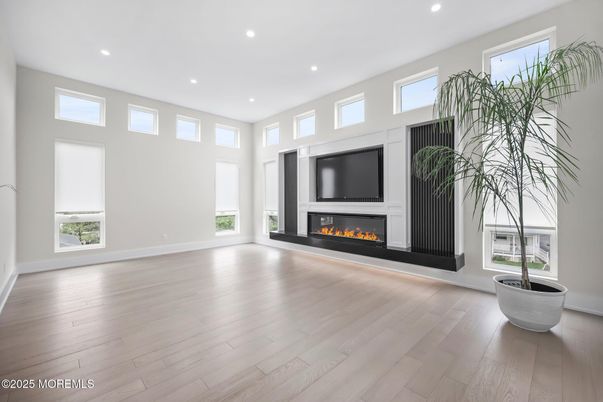 Empty room, Fireplace, Interior, Recessed Lighting, Wood Texture Flooring