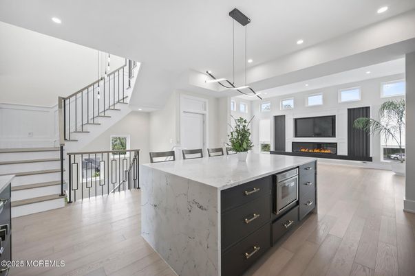 Fireplace, Interior, Kitchen, Pendant Lights, Recessed Lighting, Wood Texture Flooring