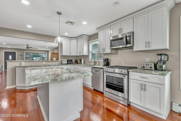 Interior, Kitchen, Pendant Lights, Recessed Lighting, Stainless Steel Appliances, Wood Texture Flooring