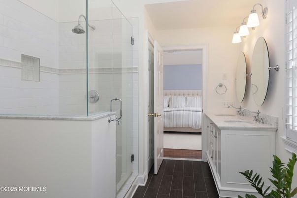 Bathroom, Bedroom, Dual Sink Vanities, Glass Shower, Interior, Wood Texture Flooring