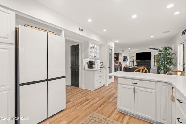 Fireplace, Interior, Kitchen, Recessed Lighting, Wood Texture Flooring