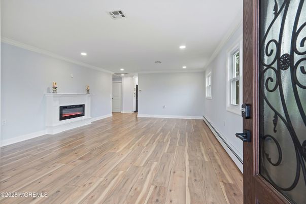 Empty room, Fireplace, Interior, Recessed Lighting, Wood Texture Flooring