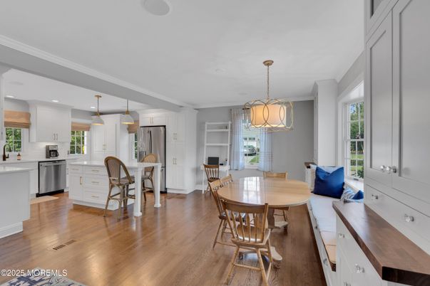 Dining room, Interior, Kitchen, Pendant Lights, Recessed Lighting, Stainless Steel Appliances, Wood Texture Flooring