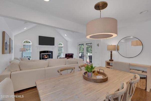 Dining room, Fireplace, Interior, Living room, Pendant Lights, Recessed Lighting, Wood Texture Flooring