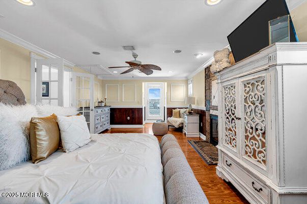 Bedroom, Fireplace, Interior, Recessed Lighting, Stone Walls, Wood Texture Flooring