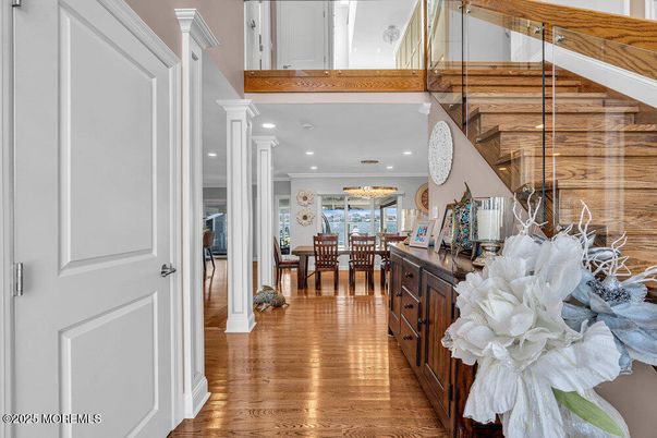Chandelier, Dining room, Interior, Pendant Lights, Recessed Lighting, Wooden Beams, Wood Texture Flooring