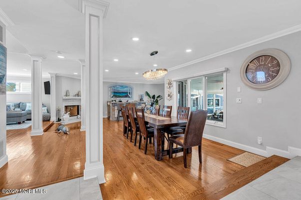 Chandelier, Dining room, Fireplace, Interior, Recessed Lighting, Wood Texture Flooring