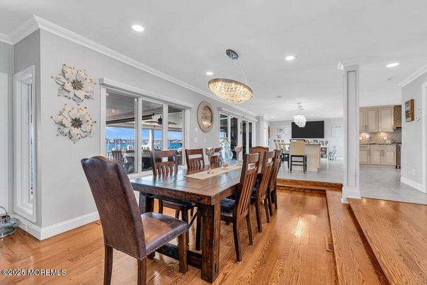 Chandelier, Dining room, Interior, Kitchen, Pendant Lights, Recessed Lighting, Water, Wood Texture Flooring
