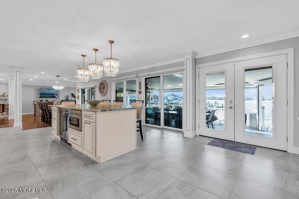 Chandelier, Fireplace, Interior, Kitchen, Living room, Recessed Lighting, Water