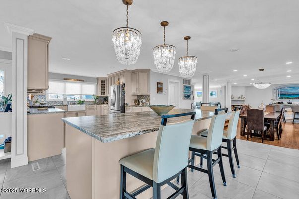Chandelier, Dining room, Interior, Kitchen, Pendant Lights, Recessed Lighting, Stainless Steel Appliances