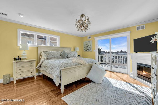 Bedroom, Fireplace, Interior, Recessed Lighting, Wood Texture Flooring