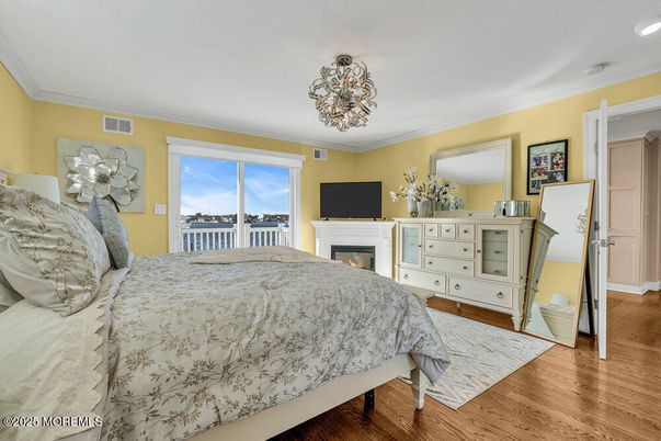 Bedroom, Fireplace, Interior, Recessed Lighting, Wood Texture Flooring