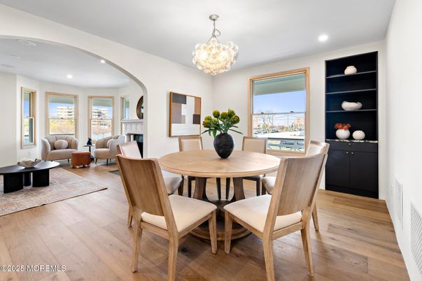 Chandelier, Dining room, Fireplace, Interior, Living room, Recessed Lighting, Wood Texture Flooring