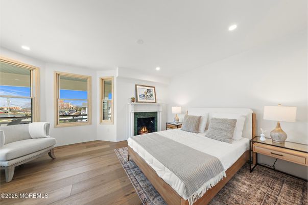 Bedroom, Fireplace, Interior, Recessed Lighting, Wood Texture Flooring
