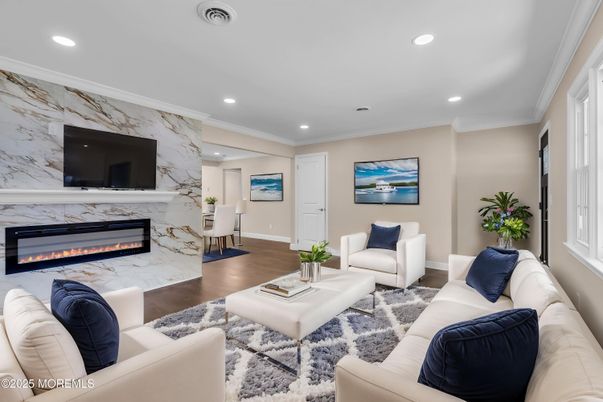 Fireplace, Interior, Living room, Marble Walls, Recessed Lighting, Wood Texture Flooring