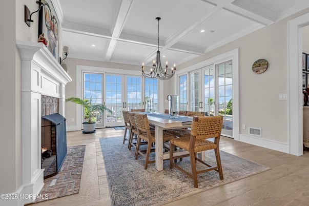 Chandelier, Dining room, Fireplace, Interior, Recessed Lighting, Wood Texture Flooring