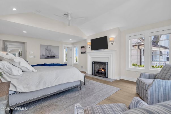 Bedroom, Fireplace, Interior, Recessed Lighting, Wood Texture Flooring