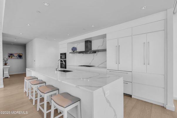 Interior, Kitchen, Marble Walls, Recessed Lighting, Wood Texture Flooring