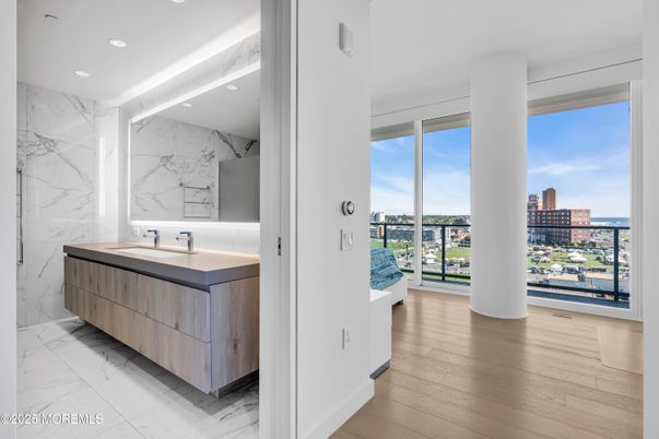 Bathroom, Interior, Marble, Marble Walls, Recessed Lighting, Water, Wood Texture Flooring