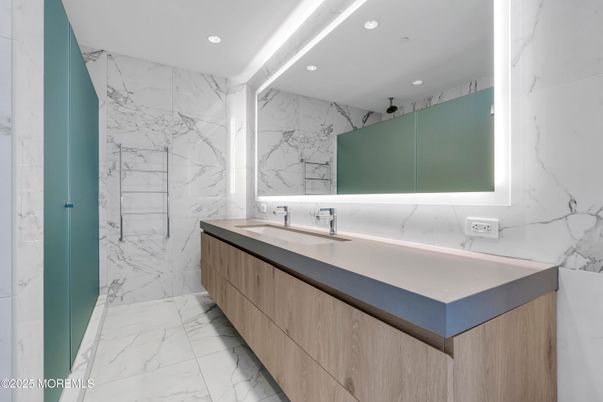 Bathroom, Dual Sink Vanities, Interior, Marble, Marble Walls, Recessed Lighting