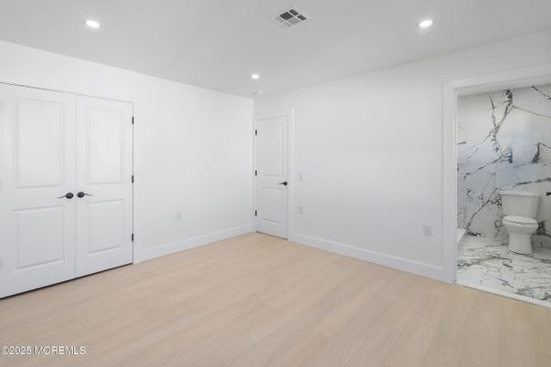 Bathroom, Empty room, Interior, Marble, Marble Walls, Recessed Lighting, Wood Texture Flooring